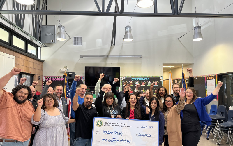 Sen. Limón and advocates form the Boys and Girls Club pose with $1 million check from the state of California
